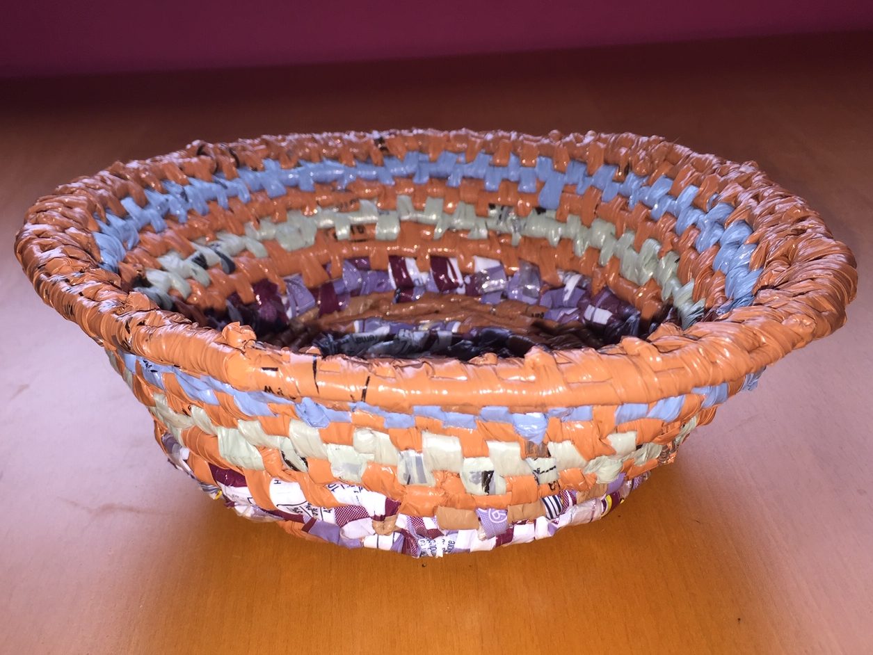 Striped basket with sloped sides