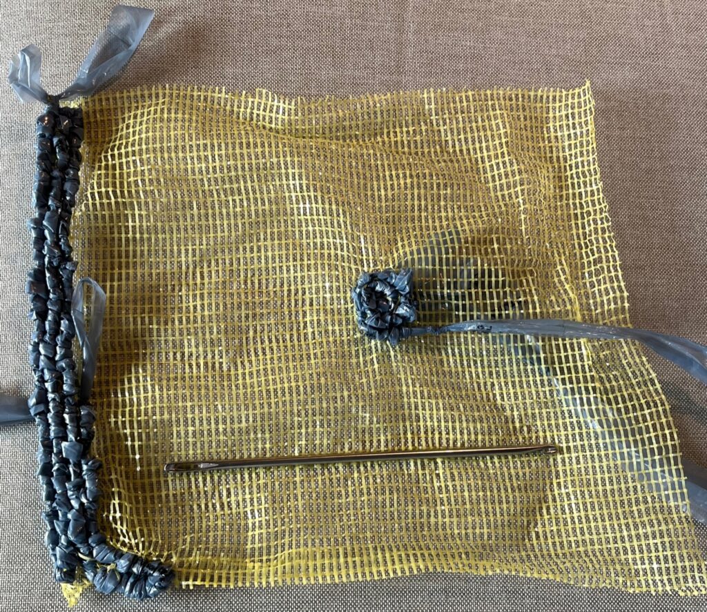 yellow mesh with grey locker hooking and locker hook 